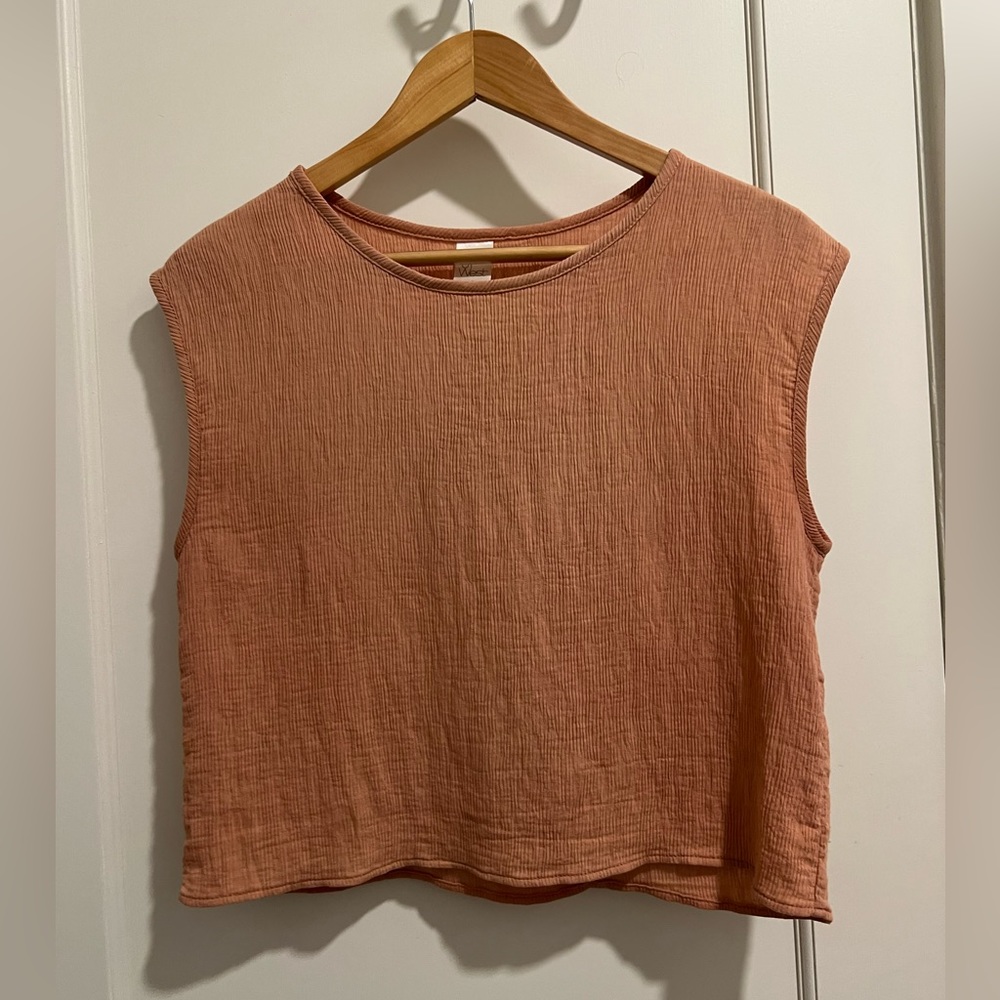 Soft pink sleeveless crop top